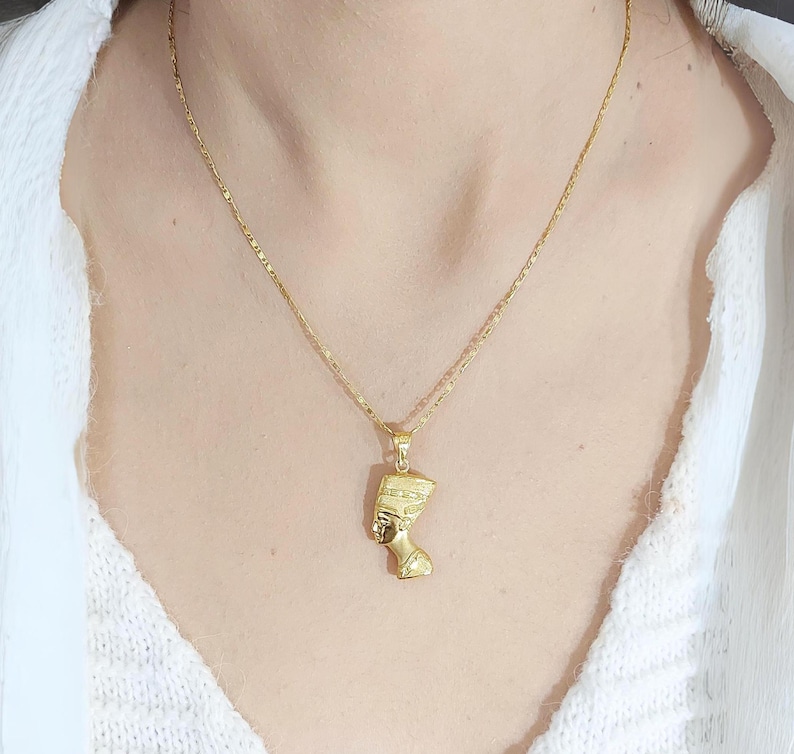 Gold Egyptian Charm
handmade jewelry
18K Gold Pendants
egyptian jewelry
egyptian necklace
pharaoh pendant
egypt gold pendant
gold pendant chain
18K gold pendant
egyptian nefertiti
nefertiti pendant
Queen Nefertiti
18k gold chain
Nefertiti necklace