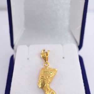 Gold Egyptian Charm
handmade jewelry
18K Gold Pendants
egyptian jewelry
egyptian necklace
pharaoh pendant
egypt gold pendant
gold pendant chain
18K gold pendant
egyptian nefertiti
nefertiti pendant
Queen Nefertiti
18k gold chain
Nefertiti necklace