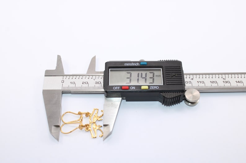 Egyptian Solid Gold 18K Earring Eye Of Horus Stamped Pharaonic Yellow Gold handmade jewelry
egyptian jewelry
ancient Egypt
Eye of Horus Earring
eye of ra
evil eye Earring
Solid Gold 18K
Gold Stamped
Eye of Horus
Stamped Earring
18K gold
evil eye