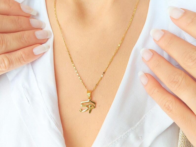 Gold Egyptian Charm
handmade jewelry
custom jewelry
women's gifts
Egyptian Necklaces
evil eye Necklaces
eye of horus charm
Eye Horus necklace
gold necklace chain
Handmade Necklace
evil eye pendant
mythology jewelry
evil eye necklace
Horus charm