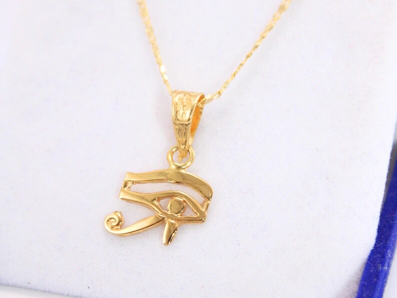 Gold Egyptian Charm
handmade jewelry
custom jewelry
women's gifts
Egyptian Necklaces
evil eye Necklaces
eye of horus charm
Eye Horus necklace
gold necklace chain
Handmade Necklace
evil eye pendant
mythology jewelry
evil eye necklace
Horus charm