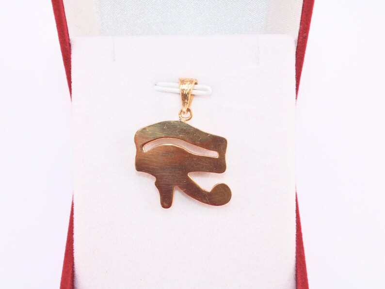 handmade jewelry
Egyptian Pendant
egyptian jewelry
ancient Egypt
Eye of Horus pendant
egypt gold pendant
gold pendant chain
eye of ra
Eye Horus necklace
egyptian necklace
eye of horus charm
18K gold pendant
evil eye pendant
mythology jewelry