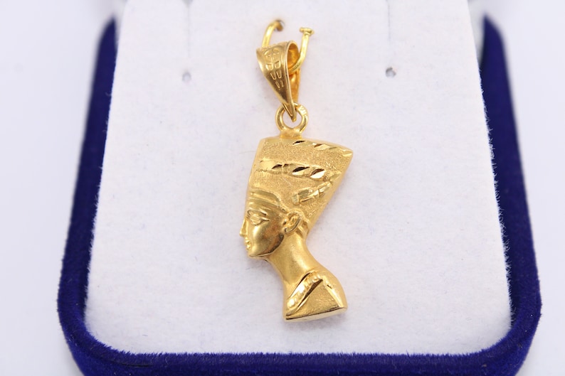Gold Egyptian Charm
handmade jewelry
18K Gold Pendants
egyptian jewelry
egyptian necklace
pharaoh pendant
egypt gold pendant
gold pendant chain
18K gold pendant
egyptian nefertiti
nefertiti pendant
Queen Nefertiti
18k gold chain
Nefertiti necklace