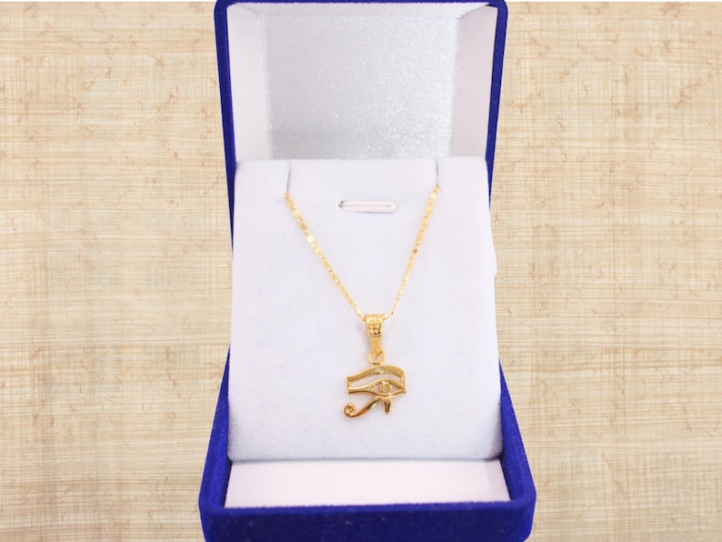 Gold Egyptian Charm
handmade jewelry
custom jewelry
women's gifts
Egyptian Necklaces
evil eye Necklaces
eye of horus charm
Eye Horus necklace
gold necklace chain
Handmade Necklace
evil eye pendant
mythology jewelry
evil eye necklace
Horus charm
