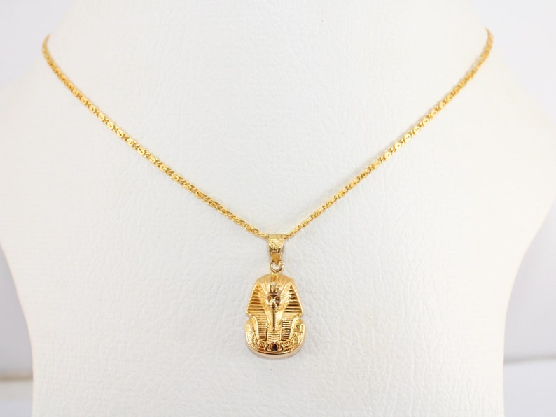 egyptian necklace egypt gold pendant
pharaoh pendant  tut pendant
egyptian king tut king tut pendant
egyptian tut 18K gold pendant
King Tut Pharaoh Jewelry
Tutankhamun pendant
Handmade jewelry
mythology jewelry
pharaonic pendant
tut mask penda