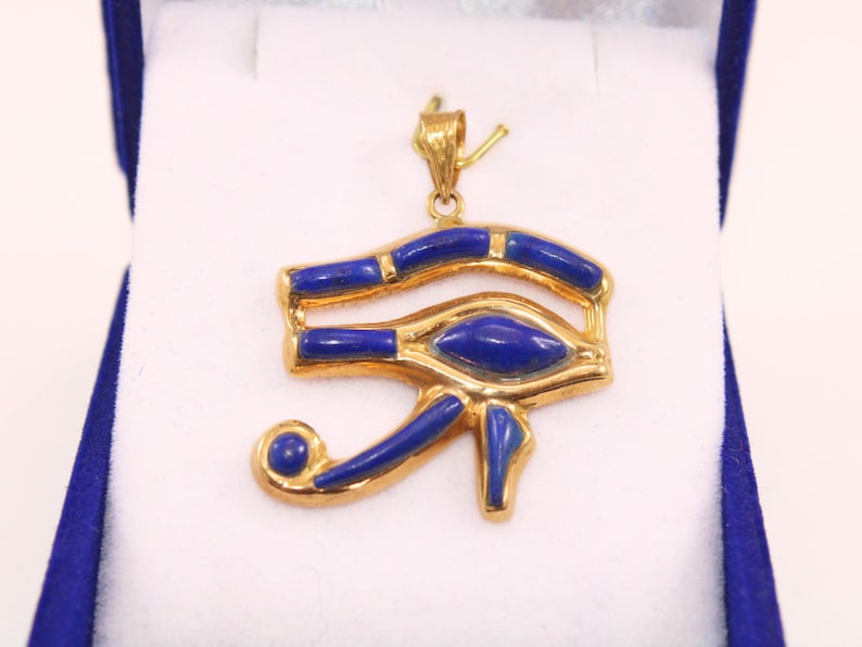 handmade jewelry
Egyptian Pendant
egyptian jewelry
ancient Egypt
Eye of Horus pendant
egypt gold pendant
gold pendant chain
eye of ra
Eye Horus necklace
egyptian necklace
eye of horus charm
18K gold pendant
evil eye pendant
mythology jewelry