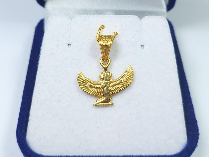Egyptian Pendant
handmade jewelry
women's pendants
custom jewelry
women's gifts
gold jewelry
Queen Isis Pendant
Isis pendant gold
egyptian jewelry
ancient Egypt
egyptian necklace
Goddess Isis wings
18K Gold Pendant
mythology jewelry
goddess pendant