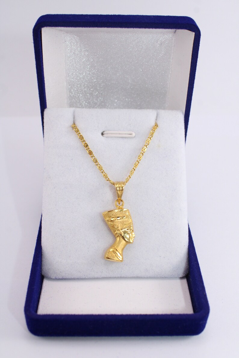 Gold Egyptian Charm
handmade jewelry
18K Gold Pendants
egyptian jewelry
egyptian necklace
pharaoh pendant
egypt gold pendant
gold pendant chain
18K gold pendant
egyptian nefertiti
nefertiti pendant
Queen Nefertiti
18k gold chain
Nefertiti necklace