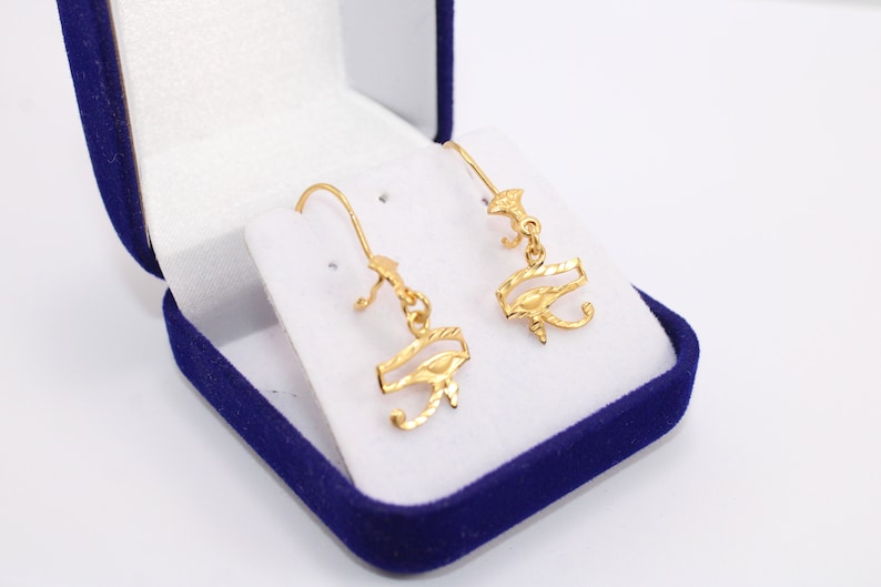 Egyptian Solid Gold 18K Earring Eye Of Horus Stamped Pharaonic Yellow Gold handmade jewelry
egyptian jewelry
ancient Egypt
Eye of Horus Earring
eye of ra
evil eye Earring
Solid Gold 18K
Gold Stamped
Eye of Horus
Stamped Earring
18K gold
evil eye