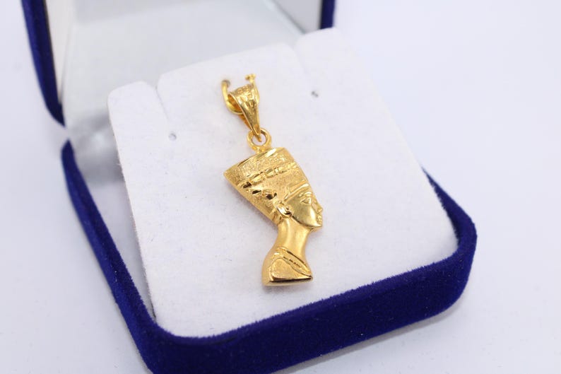 Gold Egyptian Charm
handmade jewelry
18K Gold Pendants
egyptian jewelry
egyptian necklace
pharaoh pendant
egypt gold pendant
gold pendant chain
18K gold pendant
egyptian nefertiti
nefertiti pendant
Queen Nefertiti
18k gold chain
Nefertiti necklace
