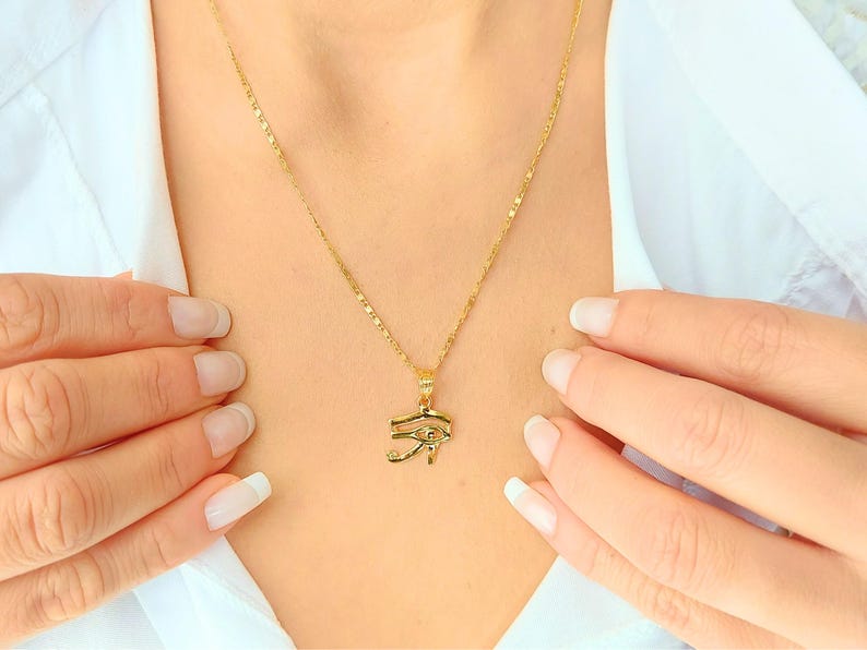 Gold Egyptian Charm
handmade jewelry
custom jewelry
women's gifts
Egyptian Necklaces
evil eye Necklaces
eye of horus charm
Eye Horus necklace
gold necklace chain
Handmade Necklace
evil eye pendant
mythology jewelry
evil eye necklace
Horus charm