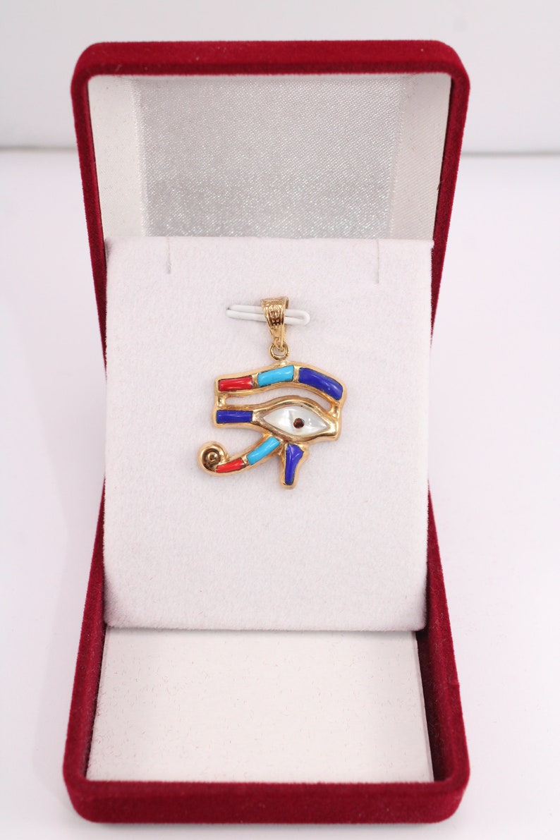 handmade jewelry
Egyptian Pendant
egyptian jewelry
ancient Egypt
Eye of Horus pendant
egypt gold pendant
gold pendant chain
eye of ra
Eye Horus necklace
egyptian necklace
eye of horus charm
18K gold pendant
evil eye pendant
mythology jewelry