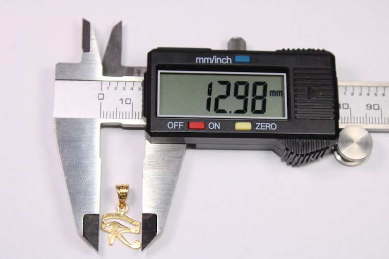 Gold Egyptian Charm
handmade jewelry
custom jewelry
women's gifts
Egyptian Necklaces
18K Gold Necklaces
women's Necklaces
Egyptian jewelry
eye of ra
evil eye Necklaces
eye of horus charm
Eye Horus necklace
gold necklace chain