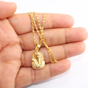 egyptian necklace egypt gold pendant
pharaoh pendant  tut pendant
egyptian king tut king tut pendant
egyptian tut 18K gold pendant
King Tut Pharaoh Jewelry
Tutankhamun pendant
Handmade jewelry
mythology jewelry
pharaonic pendant
tut mask penda