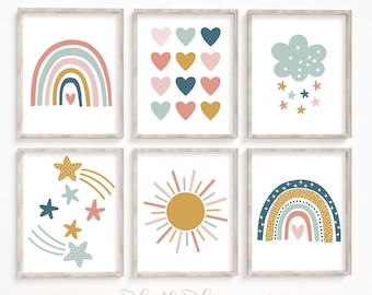 Könnte beinhalten: Sechs gerahmte Kunstdrucke mit weißem Hintergrund. Die Drucke zeigen farbenfrohe Illustrationen eines Regenbogens, Herzen, einer Wolke mit Sternen, Sternschnuppen, einer Sonne und eines Regenbogens. Der Satz "make this day count" steht unten in Kursivschrift.