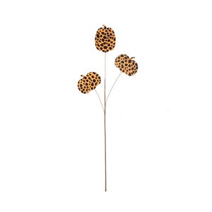 May include: A decorative stem featuring three pumpkin-shaped ornaments. The pumpkins have a tan and black leopard print pattern. The stem is brown and the pumpkins are attached to the stem with thin brown wires. The background is white.