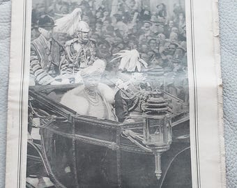 May include: A vintage newspaper titled The Daily Telegraph Silver Jubilee Supplement dated May 7, 1935. The black and white front page features a photograph of the King and Queen in a horse-drawn carriage, with a caption about their journey.