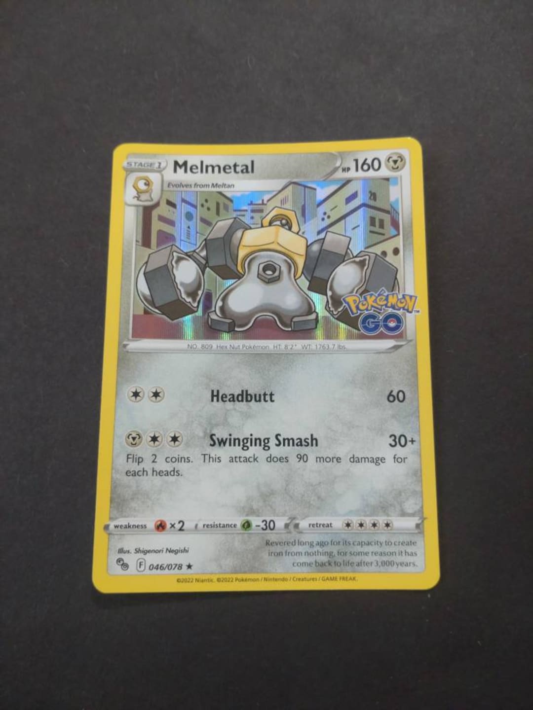 revered cards pokemon Melmetal (046/078) [Pokemon GO] – Pokemon Plug main image 1