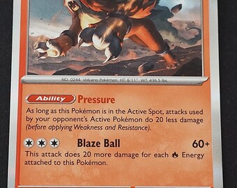 May include: A rectangular Entei trading card with a fire-type theme. The card features an illustration of the brown and black Entei creature, 130 HP, the Ability Pressure, and the Blaze Ball attack. Text includes stats, game rules, and copyright info.