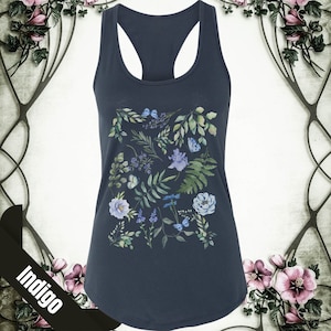 May include: A dark blue tank top with a floral print featuring blue and green flowers, leaves, and butterflies.