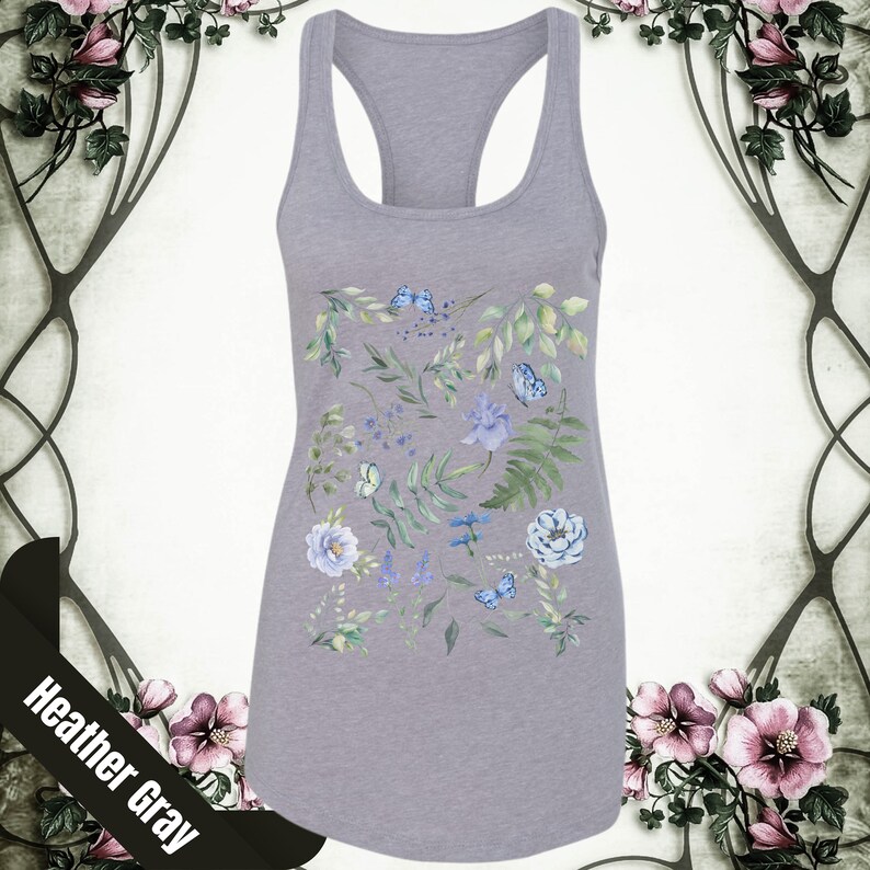 May include: A heather gray tank top with a floral print featuring blue flowers, green leaves, and blue butterflies.