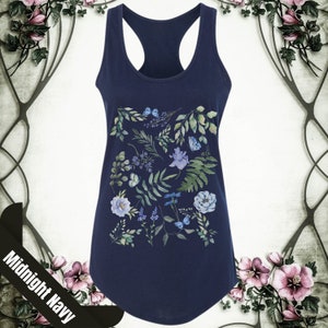 May include: A navy blue racerback tank top with a floral print featuring blue and green leaves, white flowers, and butterflies.