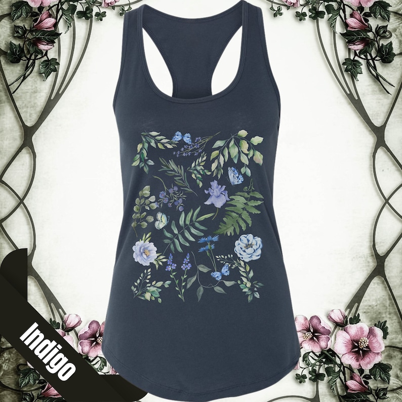 May include: A dark blue tank top with a floral print featuring blue and green flowers, leaves, and butterflies.