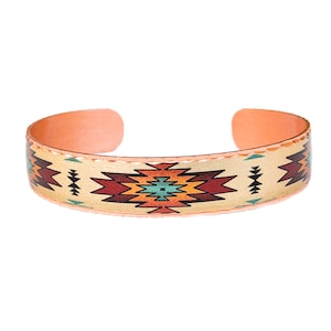 May include: A copper bracelet with a Southwestern-style geometric pattern in shades of red, orange, yellow, blue, and green.