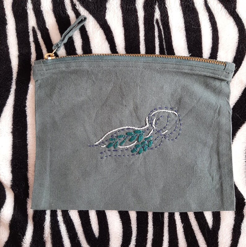 Medusa embroidered pouch