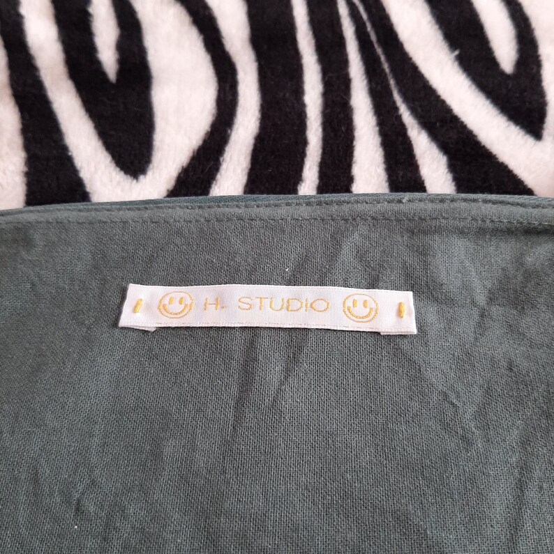 Medusa embroidered pouch