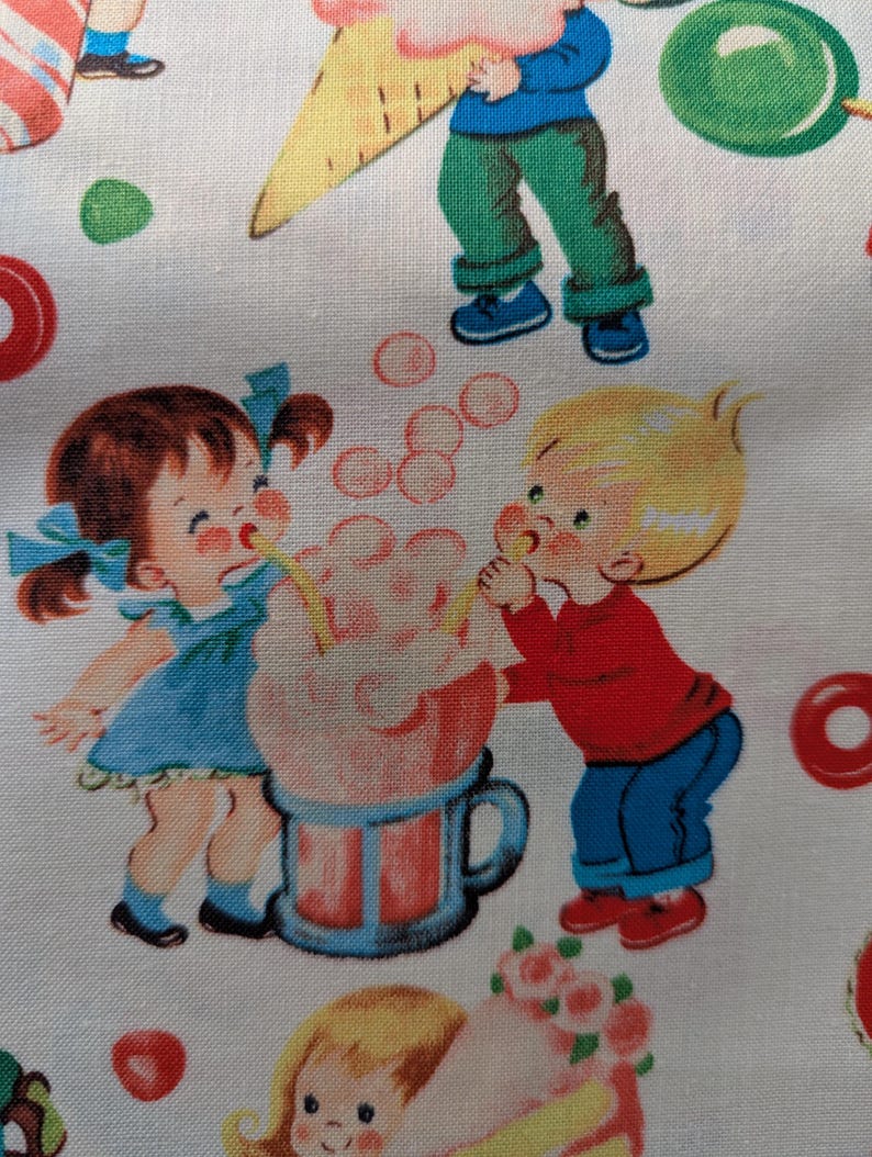 May include: White fabric with a repeating pattern of vintage illustrations. The design features children enjoying treats like ice cream cones and cotton candy. The children are dressed in bright colors, and the overall aesthetic is nostalgic and cheerful.