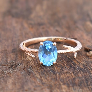 Swiss Blue Topaz Ring: Oval Sterling Silver Engagement Ring