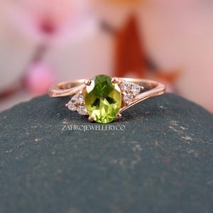 Oval Peridot Ring: Three Stone Sterling Silver August Birthstone