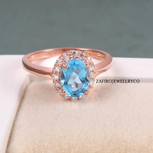 Swiss Blue Topaz Ring: Sterling Silver Halo, December Birthstone