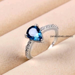 Pear Swiss Blue Topaz Ring: Sterling Silver December Birthstone