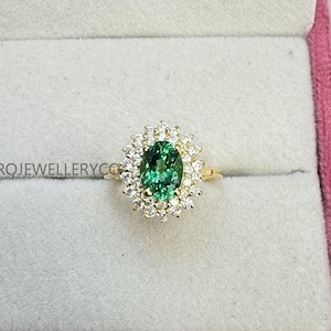 Emerald Halo Ring: Oval Cut, Sterling Silver, May Birthstone
