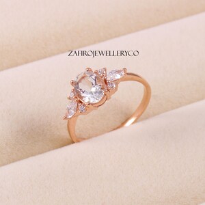 Oval Aquamarine Ring: Sterling Silver, Zircon Halo, March Birthstone
