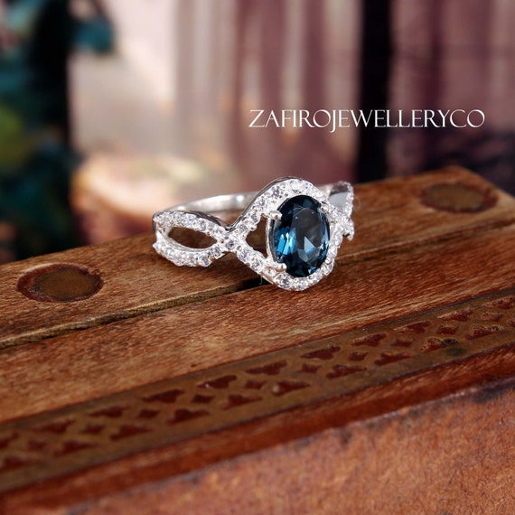 London Blue Topaz 23 Round White Zircon Sterling Silver Blue