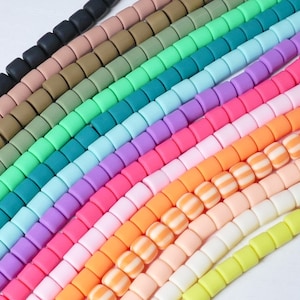 1 rang de perles cylindriques en pâte polymère - plusieurs coloris au choix