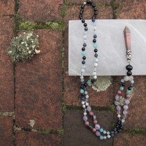 Handmade beaded necklace for self-love, protection and strength.