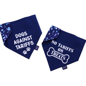 May include: Two blue dog bandanas with white text. One bandana says "Dogs Against Tariffs" with two paw prints. The other bandana says "No Tariffs on Treats" with a bone graphic.