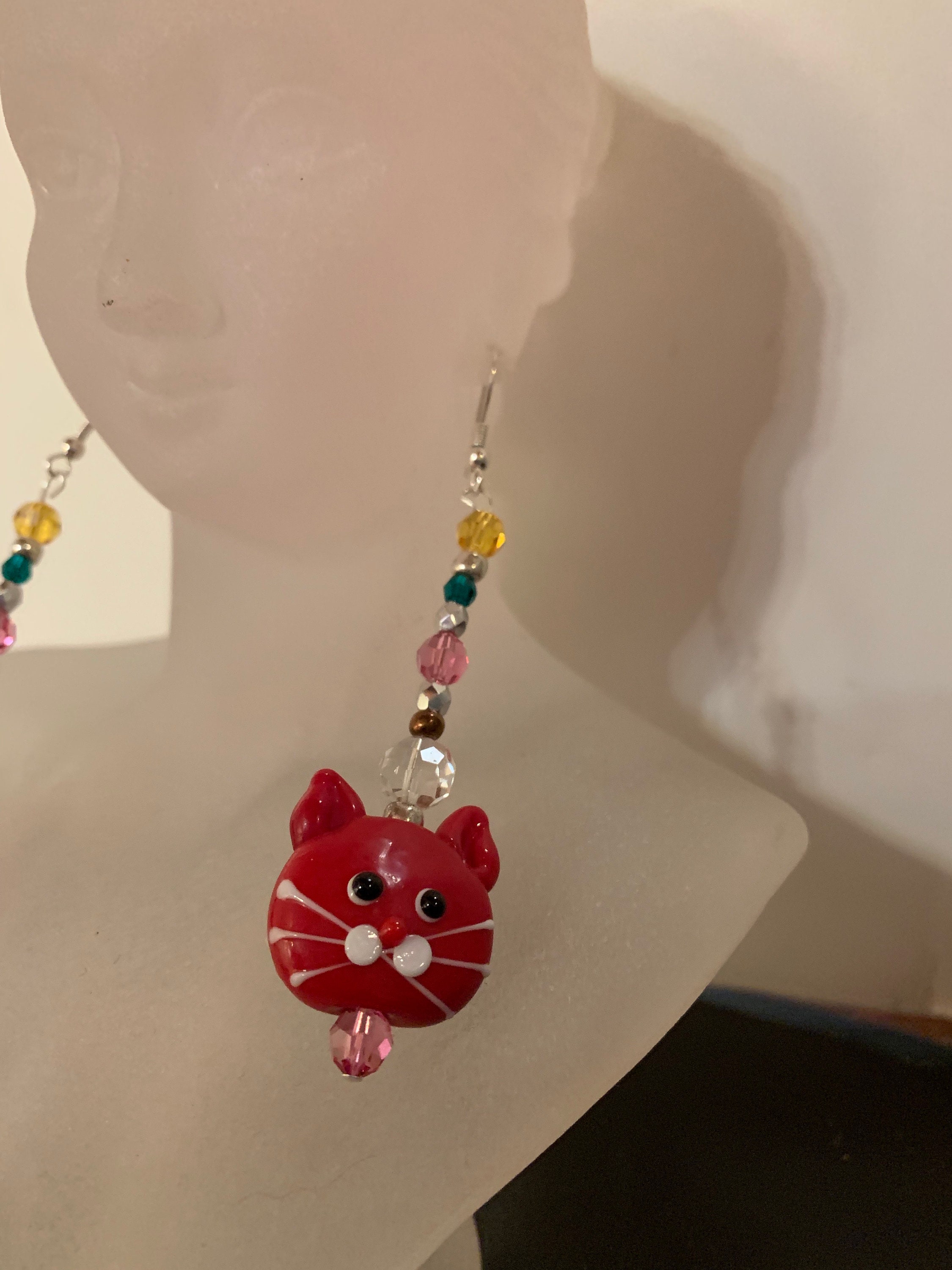 Dangling Lampworked Cat face earrings Etsy