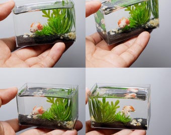 Miniature clay axolotl in the tank