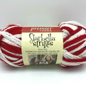 May include: A ball of red and white striped acrylic yarn, labeled "Premier Yarns Starbella Stripes", with a net weight of 3.5 ounces and 33 yards.