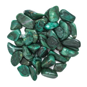 May include: A collection of green tumbled stones, likely aventurine, arranged in a heart shape. The stones are smooth and polished, with a variety of shades of green.