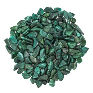 May include: A large pile of green tumbled stones. The stones are smooth and have a slightly sparkly finish.