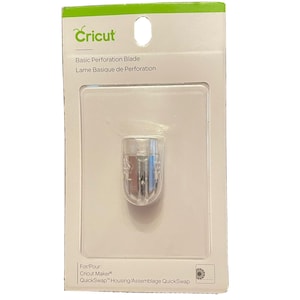 May include: A clear plastic housing for a Cricut Maker® QuickSwap™ blade. The blade is a basic perforation blade for creating perforated lines in paper or cardstock. The packaging includes the text "For/Pour: Cricut Maker® QuickSwap™ Housing/Assemblage QuickSwap".