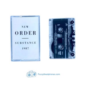 May include: A clear cassette tape case and cassette tape with the text "NEW ORDER SUBSTANCE 1987". The cassette tape is dark green with white text. The cassette tape case is clear.