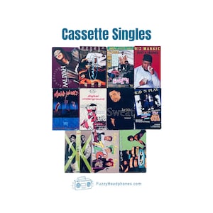 May include: A collection of vintage cassette singles featuring various artists, including Aaliyah, Biz Markie, and TLC. The image displays the cassette tapes with their album art, showcasing a variety of colors and designs. The text "Cassette Singles" is at the top.
