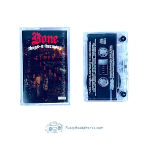 May include: A Bone Thugs-n-Harmony E. 1999 Eternal cassette tape in a clear plastic case. The cover features the group name in red text and the album title in white. The cassette itself is black with white text listing the tracklist and credits.